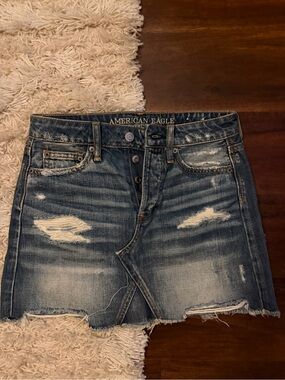 American Eagle Outfitters Distressed Blue Denim Mini Skirt with Frayed Hem